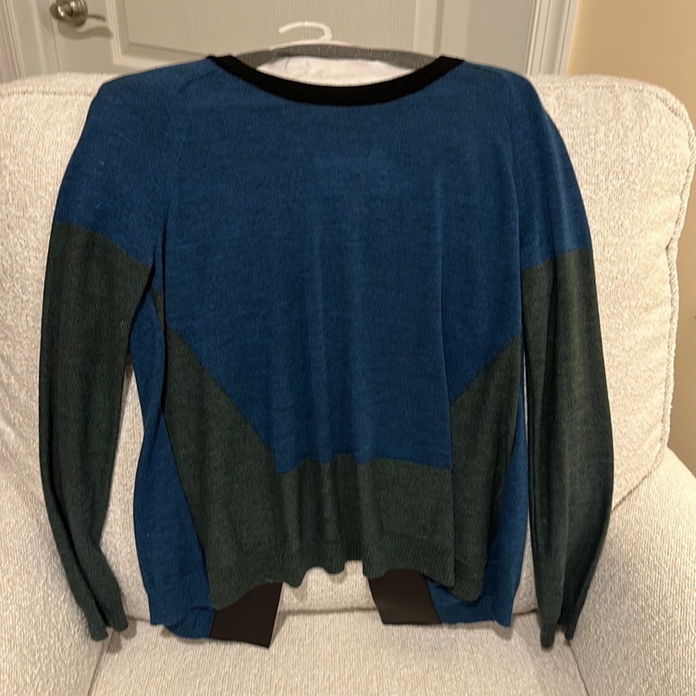 Aiko color block sweater with leather trim on back